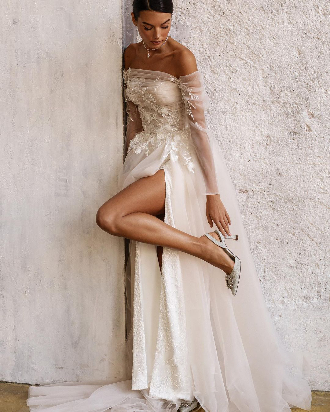 Elegant Lace Mermaid Wedding Gown with Off Shoulder Detail and High Split Tulle Skirt