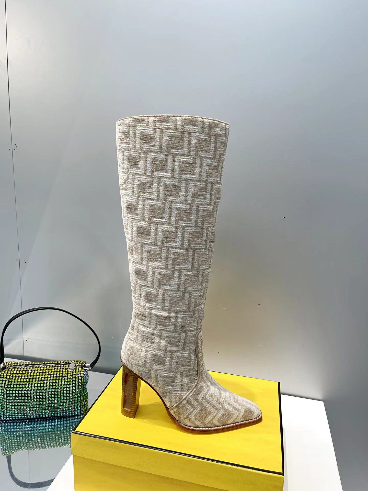 2023 High-heeled chenile boots Baguette boot with square toe with blue and black jacquard motif Heel height 110 mm, Sandy brown
2023 High-heeled chenile boots Baguette boot with square toe with blue and black jacquard motif Heel height 110 mm, Sandy brown