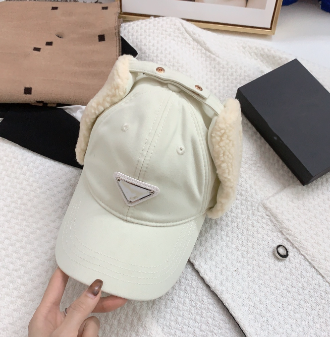 Top luxury designer ear protection cap triangle logo letters winter lambswire thickened thermal baseball caps fashion Lei Feng hat, With logo
Top luxury designer ear protection cap triangle logo letters winter lambswire thickened thermal baseball caps fashion Lei Feng hat, With logo