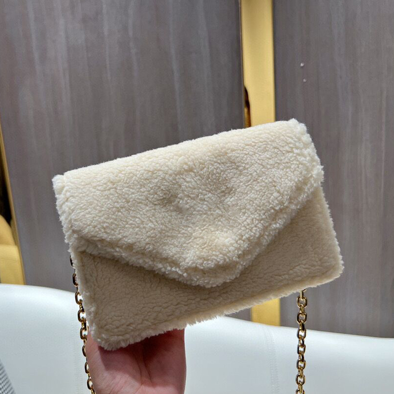 2022 winter gold chain bags Fashion designer womens Lambhair CrossBody Flap Handbag Chains Lambhair ladies Shoulder Bag Cute Cross Body Clutch Handbags, Beige
2022 winter gold chain bags Fashion designer womens Lambhair CrossBody Flap Handbag Chains Lambhair ladies Shoulder Bag Cute Cross Body Clutch Handbags, Beige