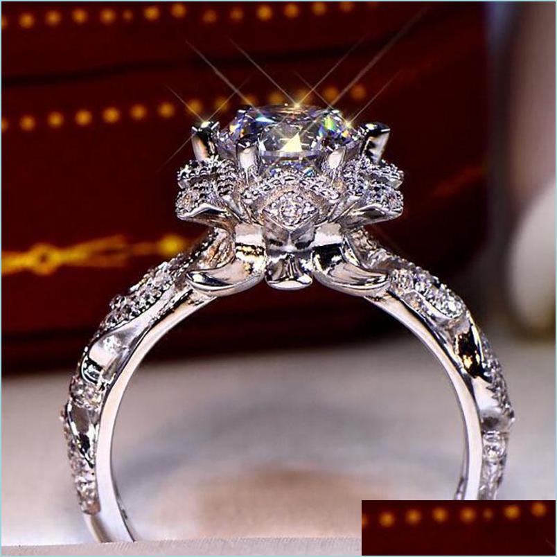 Wedding Rings Wedding Rings Starry Flowers 1 Carat Engagement Womens Bride Sier Color Hollow Out Luxury Ring On Finger Jewelry Kar22 Dhlrx
Wedding Rings Wedding Rings Starry Flowers 1 Carat Engagement Womens Bride Sier Color Hollow Out Luxury Ring On Finger Jewelry Kar22 Dhlrx