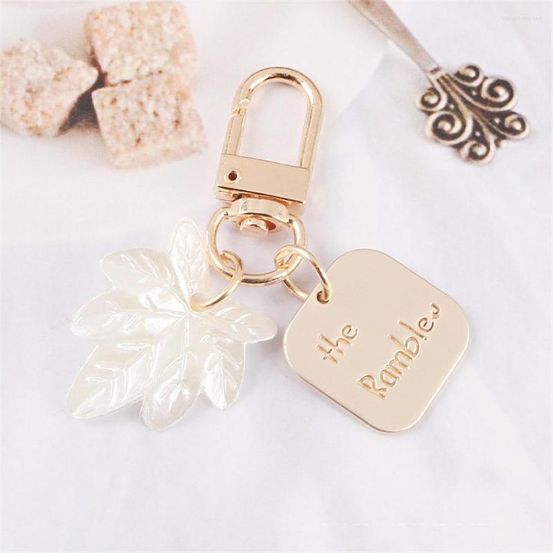 Keychains Women Girls Heart Shell Charms Fashion Elegant Letter Label Imitation Pearls Key Chain Handbag Hanging Pendant Keyring
Keychains Women Girls Heart Shell Charms Fashion Elegant Letter Label Imitation Pearls Key Chain Handbag Hanging Pendant Keyring