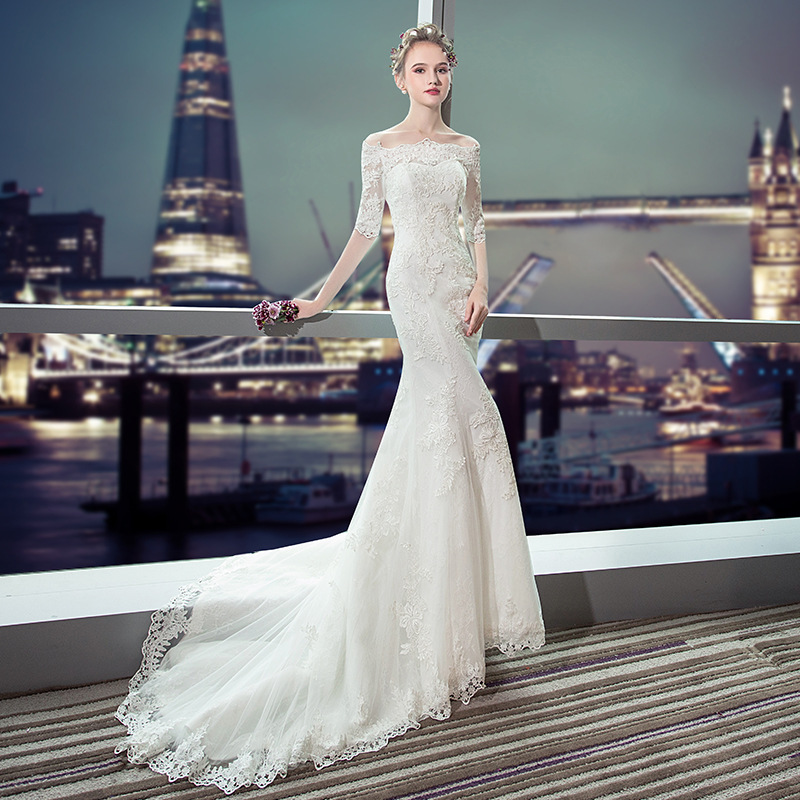 Luxury Sparkly 2023 Mermaid Wedding Dress Sexy Sheer Bling Beads Lace Applique sexy Illusion Long Sleeve Champagne Trumpet Bridal Gowns