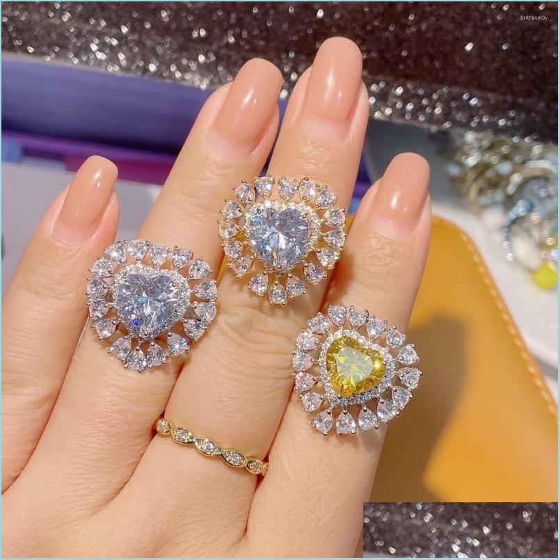 Wedding Rings Wedding Rings Trendy Luxury Heart Cubic Zircon Engagement Finger For Women Dubai Bridal Adjust Ring J2096 Drop Deliver Dh5Zv
Wedding Rings Wedding Rings Trendy Luxury Heart Cubic Zircon Engagement Finger For Women Dubai Bridal Adjust Ring J2096 Drop Deliver Dh5Zv