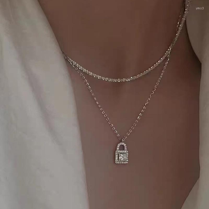 Pendant Necklaces Korea S925 Sterling Silver Light Luxury Zircon Small Lock Necklace For Women Simple Chic Design Sense Clavicle Chain
Pendant Necklaces Korea S925 Sterling Silver Light Luxury Zircon Small Lock Necklace For Women Simple Chic Design Sense Clavicle Chain