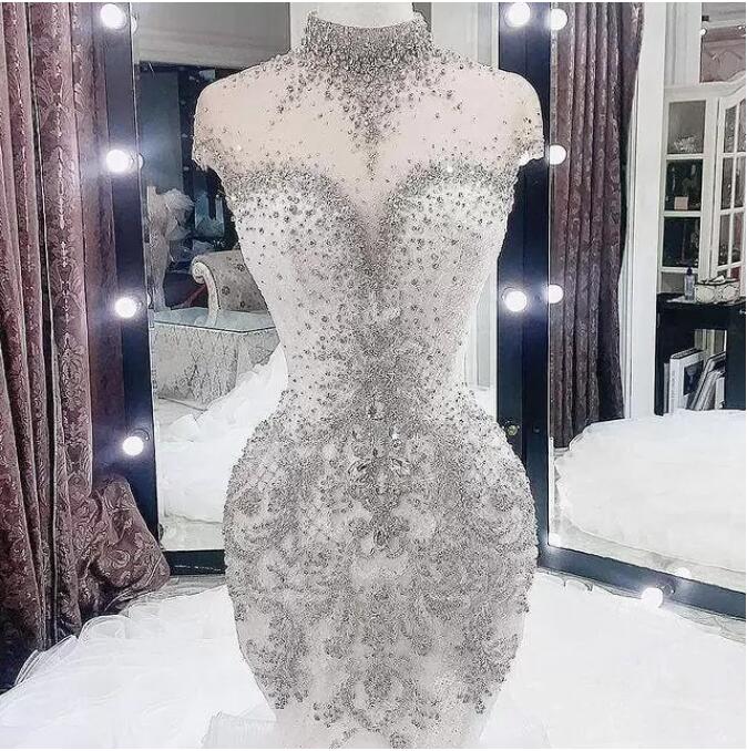 Plus Size Arabic Aso Ebi mermaid Wedding Dresses Luxurious Beaded Crystals sheer High Neck trumpet Bridal Dresses Robe De Mariee