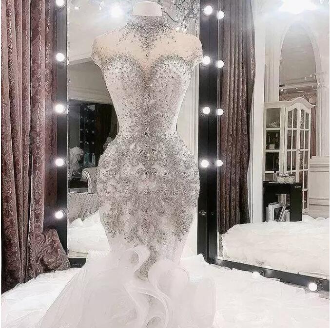 Plus Size Arabic Aso Ebi mermaid Wedding Dresses Luxurious Beaded Crystals sheer High Neck trumpet Bridal Dresses Robe De Mariee
