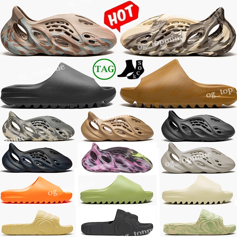 Designer Slippers Foam Slide 36-48 Glow Green Bone Black Blue Pure Resin Orange Soot Rubber Slipper Runner Sandales Mens Womens Slipper Sandals Mx Carbon Onyx Ochre
Designer Slippers Foam Slide 36-48 Glow Green Bone Black Blue Pure Resin Orange Soot Rubber Slipper Runner Sandales Mens Womens Slipper Sandals Mx Carbon Onyx Ochre