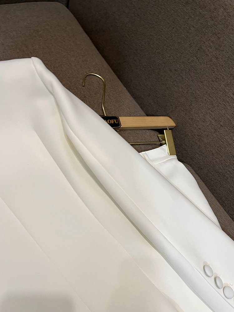 Autumn white and black solid color two-piece long sleeved split single button sports jacket top high waisted flared pants long pants set