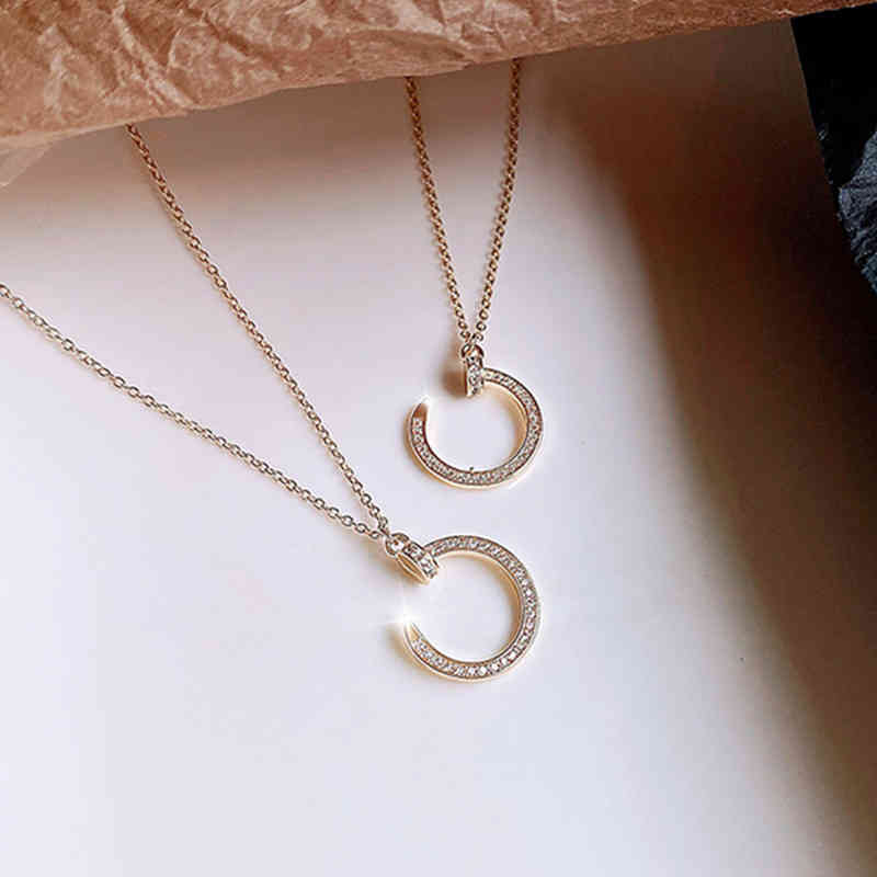 Creative diamond inlaid nail necklace Women's popular pendant Cool style Small crowd design Light luxury collarbone chain High sense
Creative diamond inlaid nail necklace Women's popular pendant Cool style Small crowd design Light luxury collarbone chain High sense