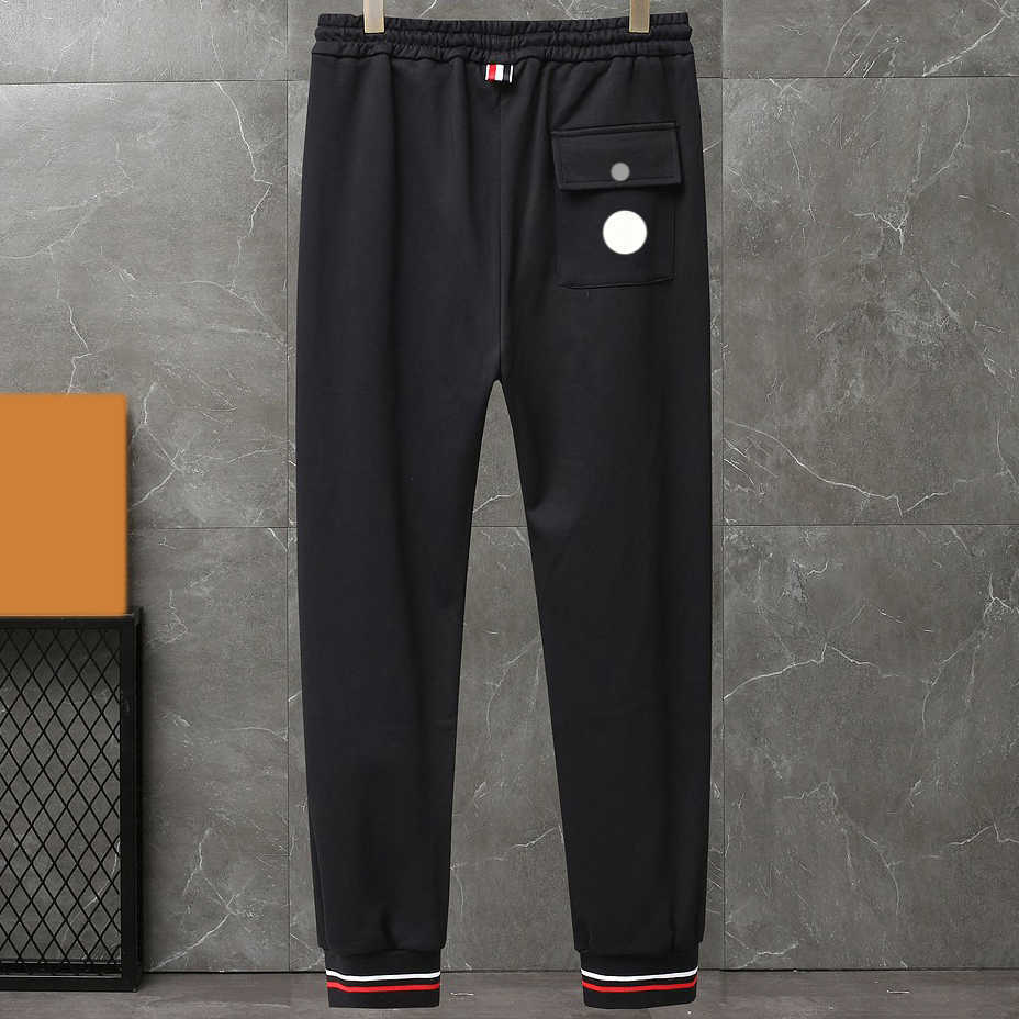 Embroidered Cargo Sweatpants: Warm Designer Couples' Trousers for Men, Cotton Terry Fabric, White
Embroidered Cargo Sweatpants: Warm Designer Couples' Trousers for Men, Cotton Terry Fabric, White