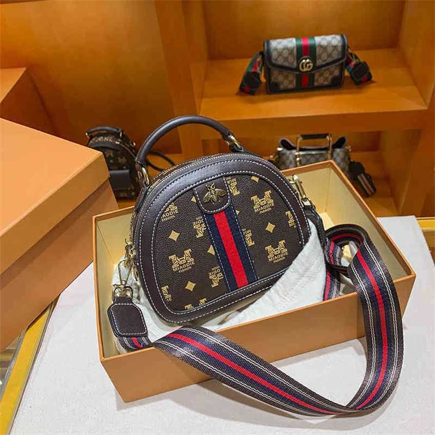 Women's bag new small round shaped versatile high quality leather one shoulder messenger women's hand Handbags sale
Women's bag new small round shaped versatile high quality leather one shoulder messenger women's hand Handbags sale