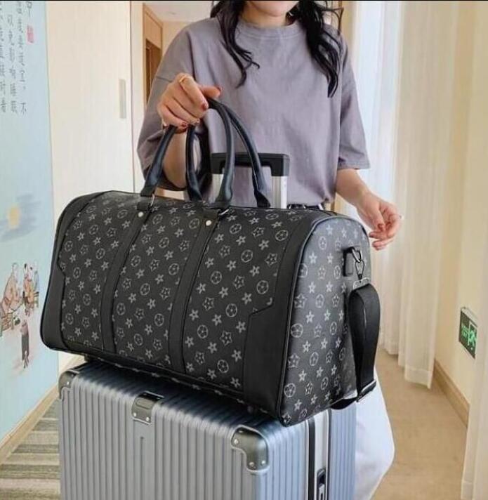 Duffel Bags Women's bag men's pu leather quality goya Fashion duffel Handbags Luxurys Designers with shoulder straps zhaoqiansun 2023, Color 
Duffel Bags Women's bag men's pu leather quality goya Fashion duffel Handbags Luxurys Designers with shoulder straps zhaoqiansun 2023, Color