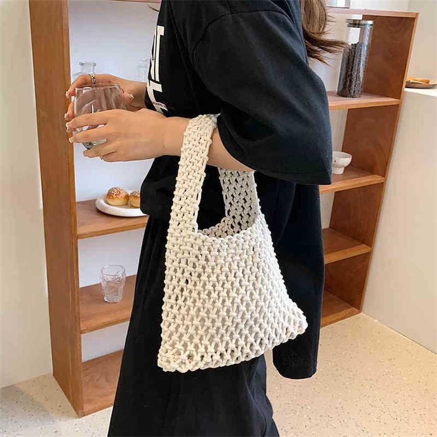 Bags hollow bag hand woven cotton rope wrist fashionable versatile beach holiday Bucket Bag Purses, White
Bags hollow bag hand woven cotton rope wrist fashionable versatile beach holiday Bucket Bag Purses, White