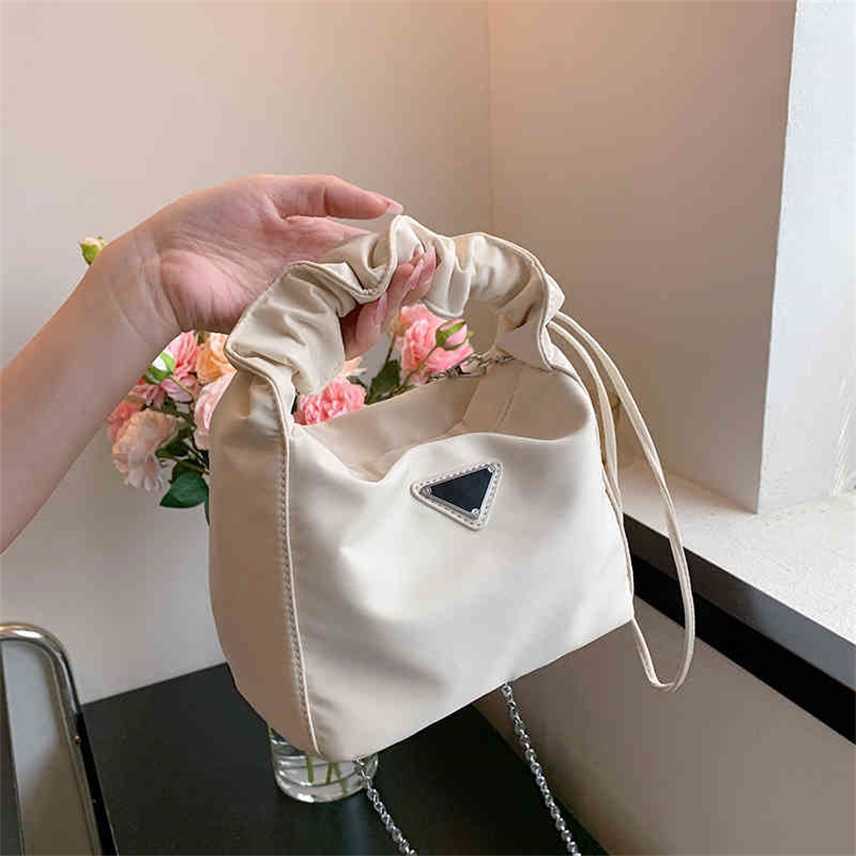 Bags Bag women's bag 2022 new vegetable basket Bucket Handbag simple popular chain sling single Shoulder Messenger Purses, Milky white
Bags Bag women's bag 2022 new vegetable basket Bucket Handbag simple popular chain sling single Shoulder Messenger Purses, Milky white