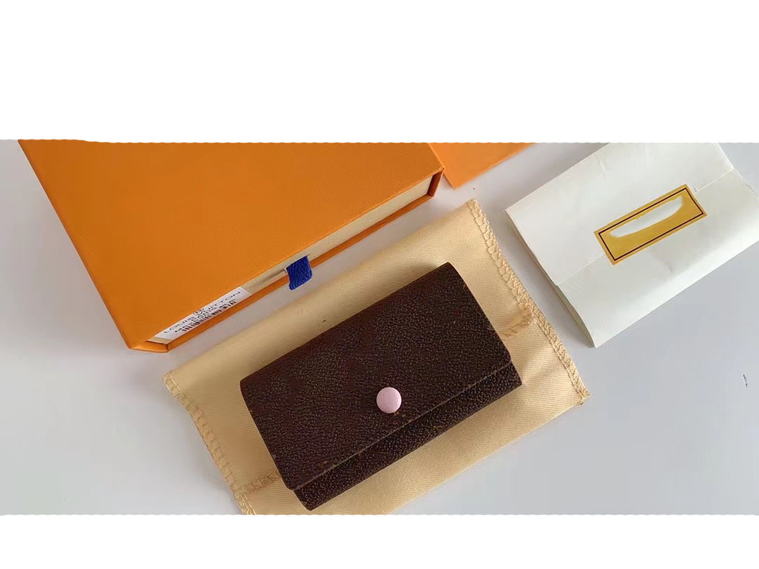 2021 luxury designer Wallets Purse Bag Fashionable Short Victorian Purses Presbyterian Letters Empreinte Classic 6 key chain purse Free ship with box, Mono inside pink
2021 luxury designer Wallets Purse Bag Fashionable Short Victorian Purses Presbyterian Letters Empreinte Classic 6 key chain purse Free ship with box, Mono inside pink