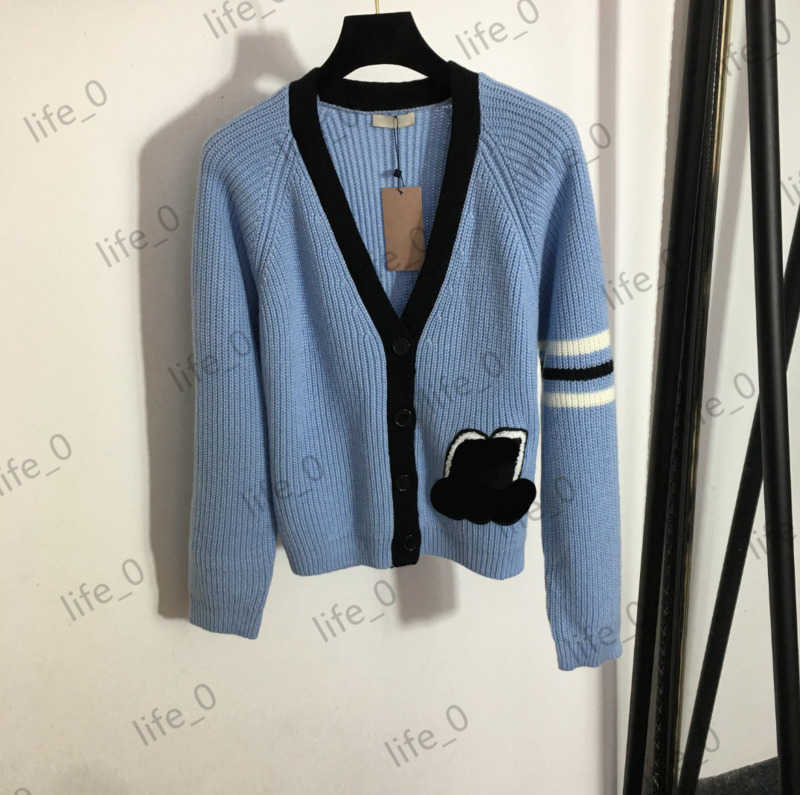 Womens Sweater Designer Cardigan Striped Long Sleeve Trim Tops Logo Printed V-neck Single Button Knitwear Cardigans Fashion Women Sweaters 1970, 10
Womens Sweater Designer Cardigan Striped Long Sleeve Trim Tops Logo Printed V-neck Single Button Knitwear Cardigans Fashion Women Sweaters 1970, 10