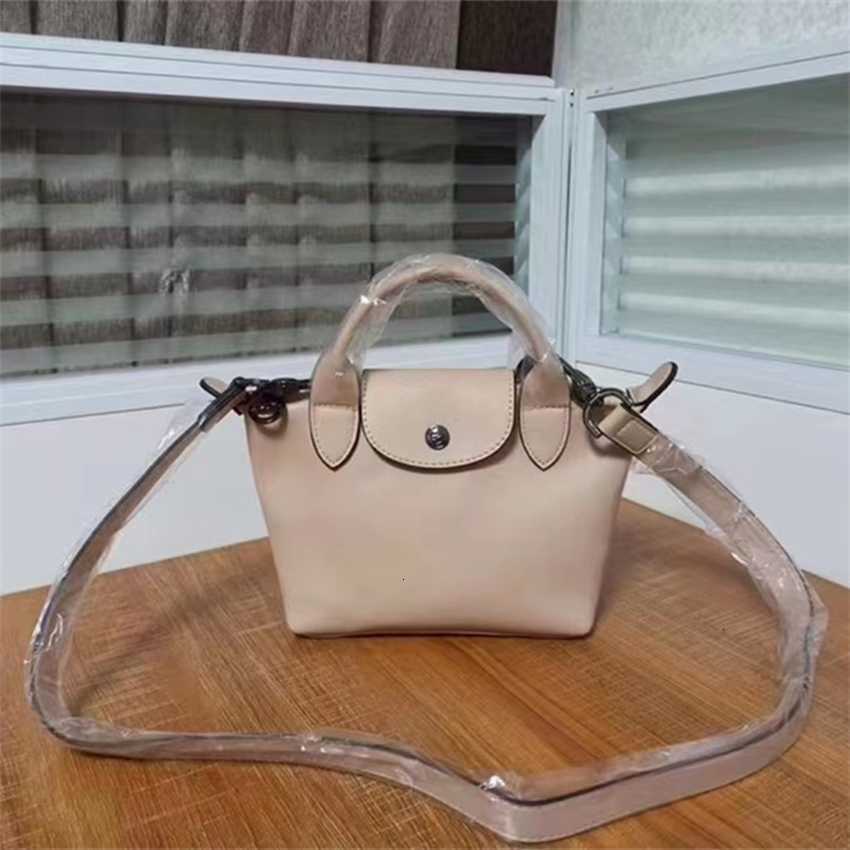 High Version Genuine Sheepskin New Dragon Set Mini Dumpling Bag Women's One Shoulder Portable Messenger Leather Tote, White
High Version Genuine Sheepskin New Dragon Set Mini Dumpling Bag Women's One Shoulder Portable Messenger Leather Tote, White