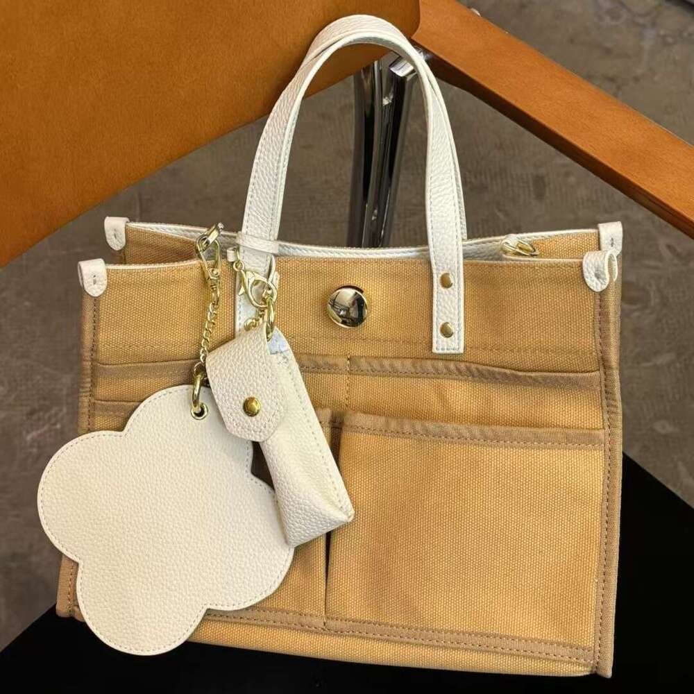 Designer Bag Tote Bag Shoulder Bag 2025 New Handheld Tote Canvas And Leather Fashion Commuter Women's Large Capacity Single Shoulder Crossbody Ba