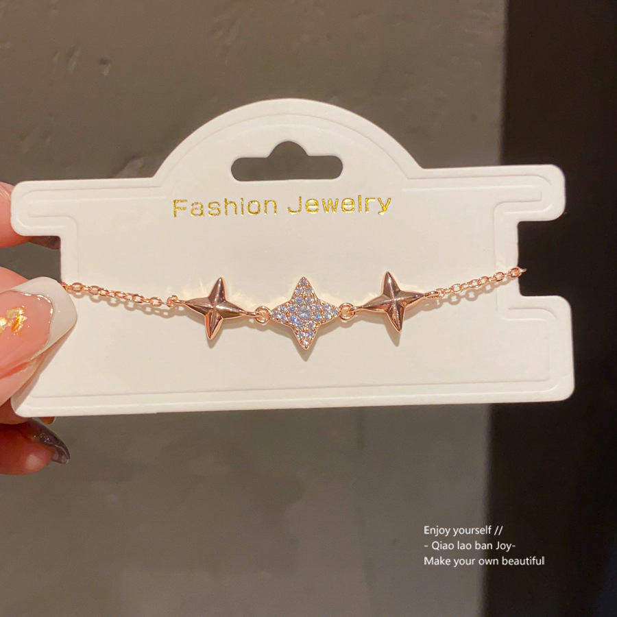Gold - Toned Bracelet with Star - Shaped Crystal and Metal Detail, Cute for Daily or Casual Outings, Delicate Fashion Jewelry