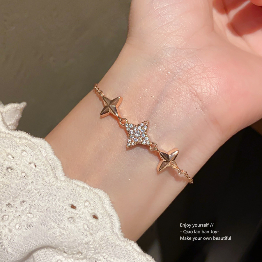 Gold - Toned Bracelet with Star - Shaped Crystal and Metal Detail, Cute for Daily or Casual Outings, Delicate Fashion Jewelry