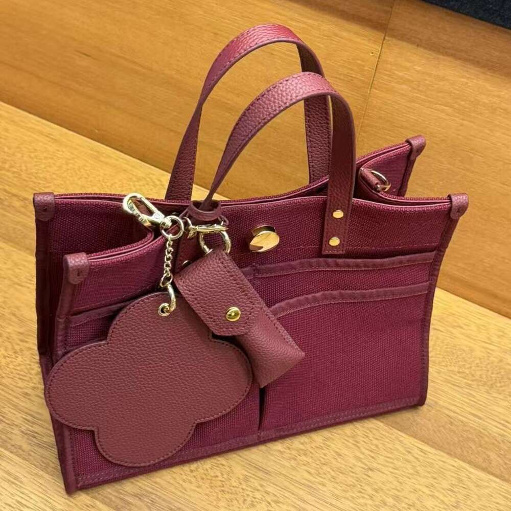 Designer Bag Tote Bag Shoulder Bag 2025 New Handheld Tote Canvas And Leather Fashion Commuter Women's Large Capacity Single Shoulder Crossbody Ba