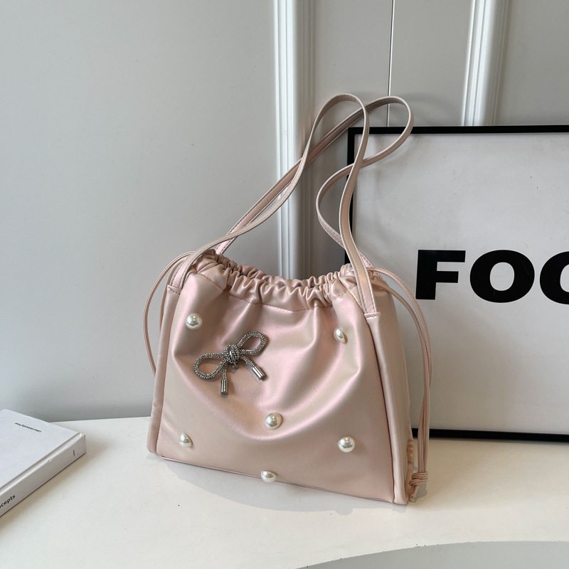 2025 autumn atmosphere New Commuter Large Capacity Women s Bag Light Luxury Elegant Pearl Bow Decorative Underarm Bag Designer Shoulder Bag