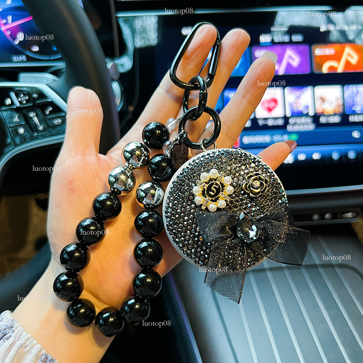 Fashion style version diamondstudded White flowers style folding creative beaded portable car keychain makeup mirror bag pendant Luxurys designer