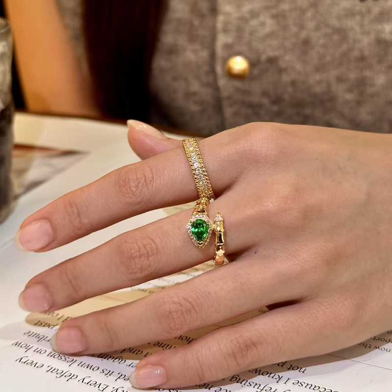 Luxury Brand Designer Jewelry New Year Green Eye Snake Bone Shape Open Ring Emerald Ring For Women Niche Light Luxury High-End Fashion Index Finger Ring