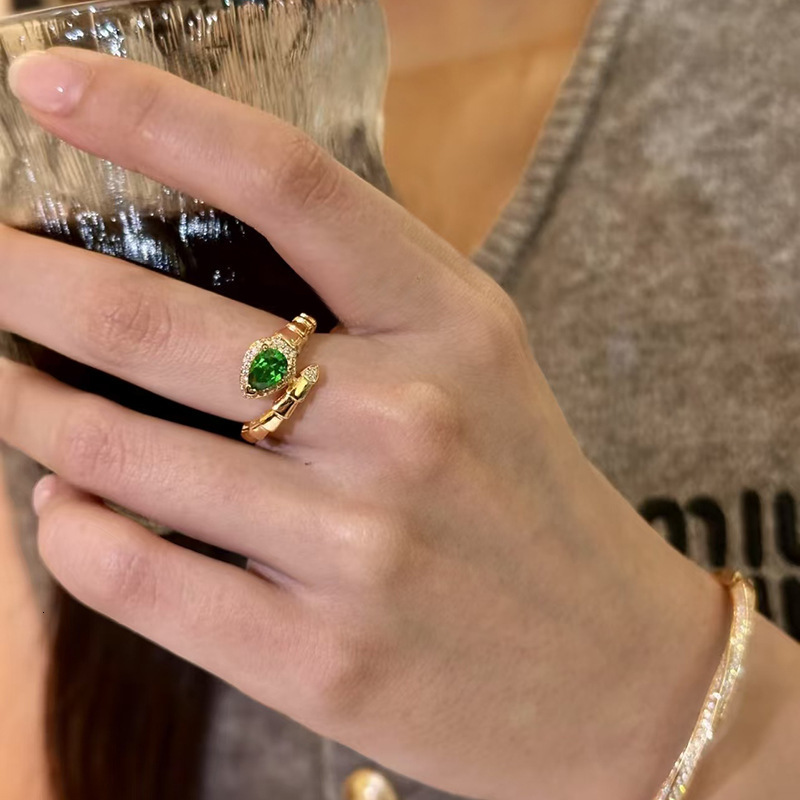 Luxury Brand Designer Jewelry New Year Green Eye Snake Bone Shape Open Ring Emerald Ring For Women Niche Light Luxury High-End Fashion Index Finger Ri