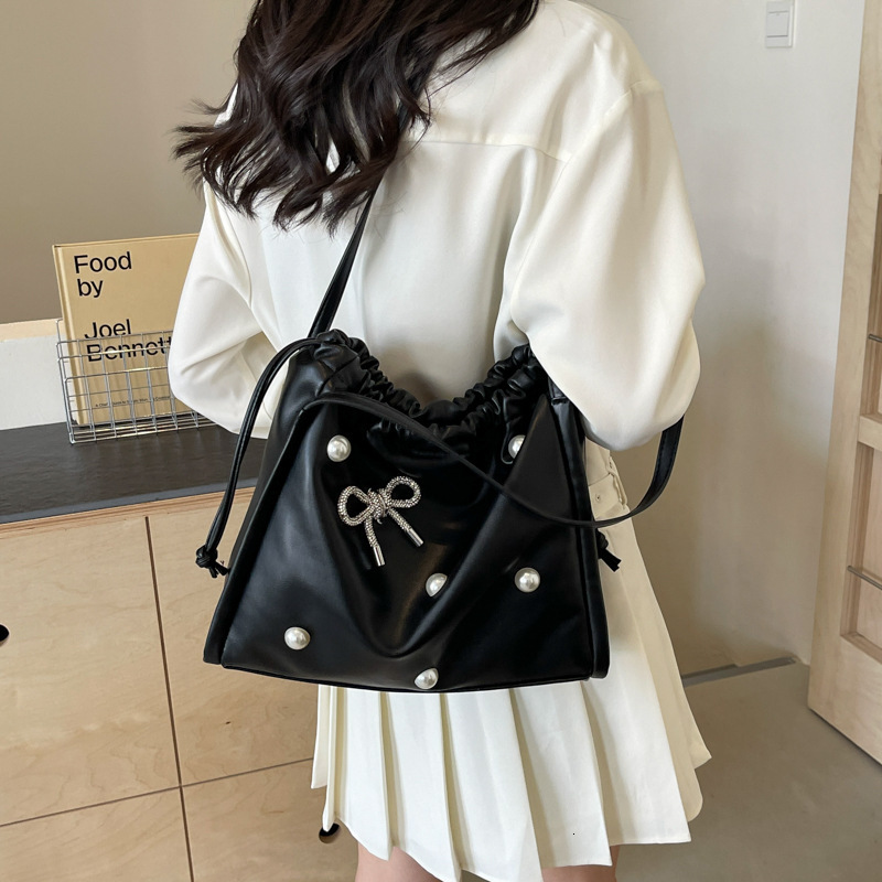 2025 autumn atmosphere New Commuter Large Capacity Women s Bag Light Luxury Elegant Pearl Bow Decorative Underarm Bag Designer Shoulder Bag