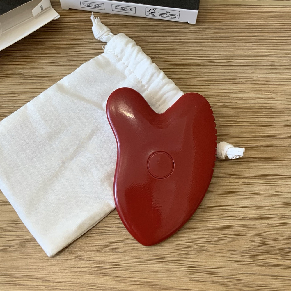 Household sundry Designer portable scraping plate face massager Detoxify Remove Puffiness Red