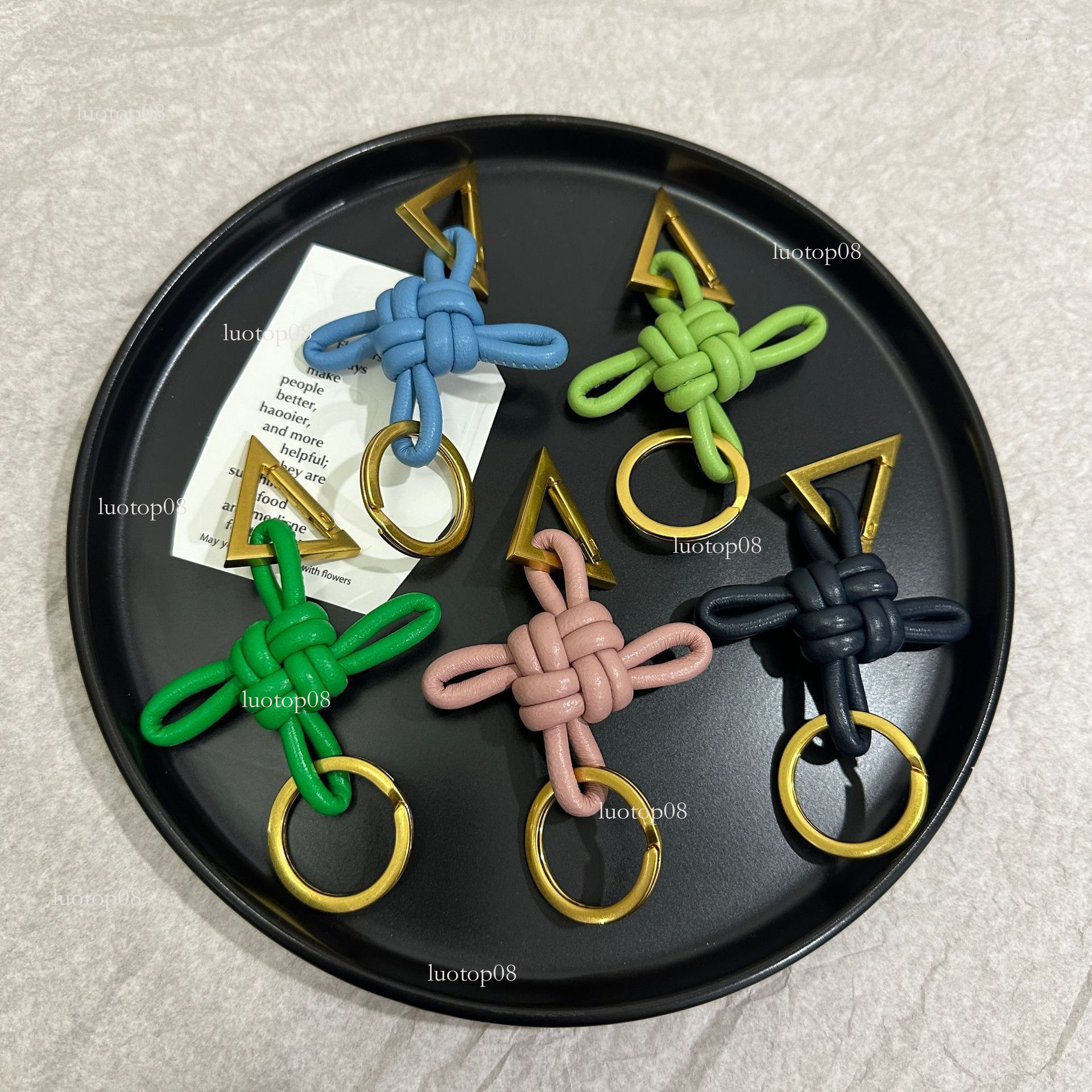 Fashion style hot selling b brand same style chinese knot sheepskin woven car keychain 2025 new genuine leather pendant Luxurys designer