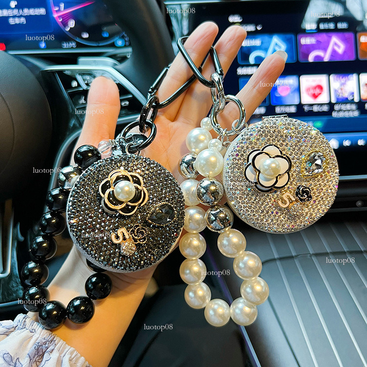 Fashion style version diamondstudded White flowers style folding creative beaded portable car keychain makeup mirror bag pendant Luxurys designer