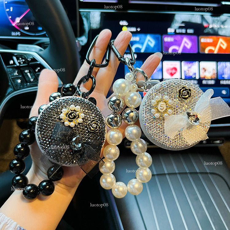 Fashion style version diamondstudded White flowers style folding creative beaded portable car keychain makeup mirror bag pendant Luxurys designer
