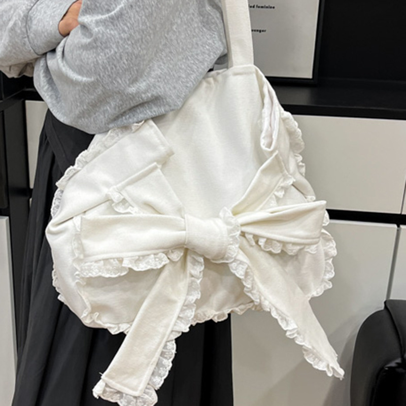 autumn new Korean sweet girl bow casual versatile simple lace handbag niche design atmosphere unique creative armpit women s bag designer shoulder bag
