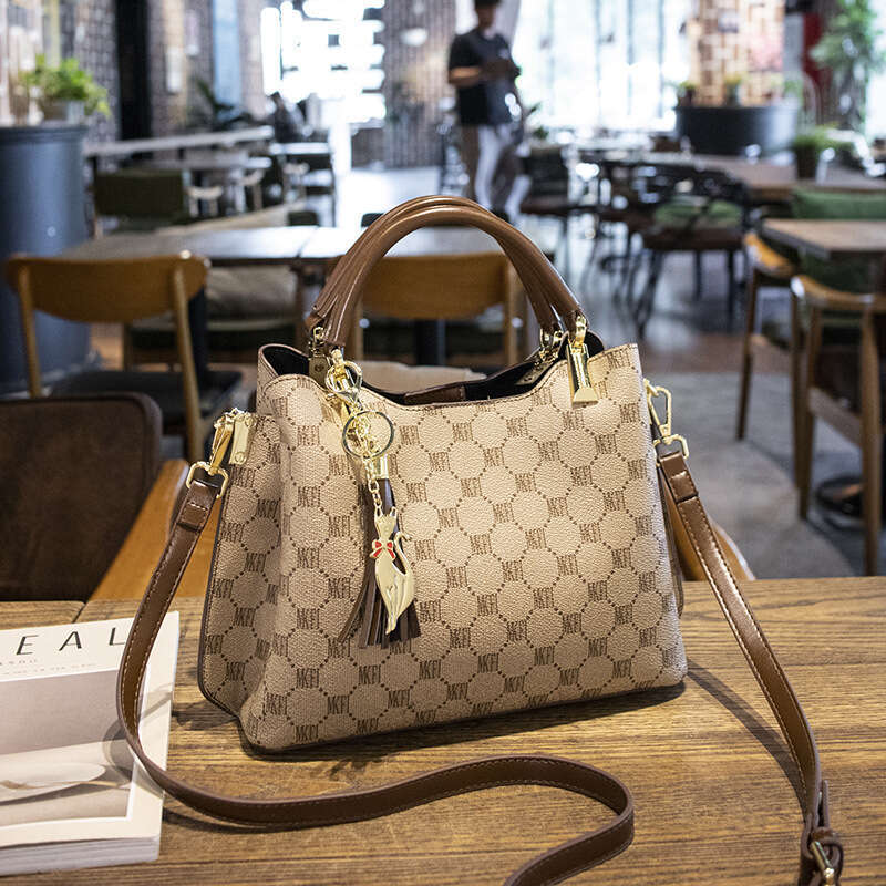 DHpet_wholesale Genuine Leather Bucket Bag - Fashion Tassel Chain Shoulder Purse for Women, Business Commute Crossbody Bag with Multiple Pockets