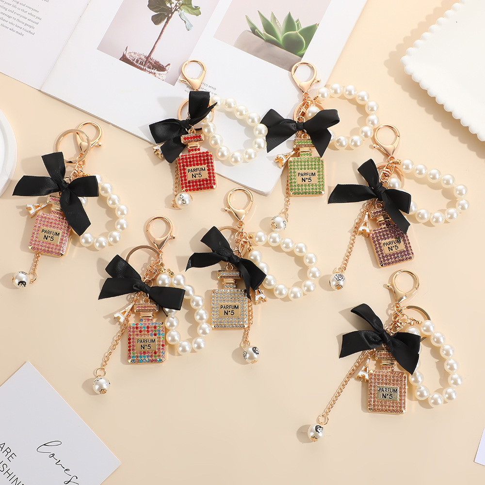 keychain designer keychain style bowknot pearl perfume bottle rhinestone bag keychain metal key pendant mini bag keychain
