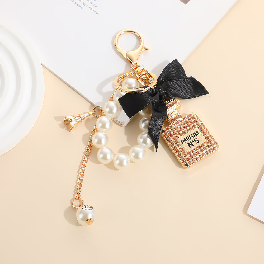 keychain designer keychain style bowknot pearl perfume bottle rhinestone bag keychain metal key pendant mini bag keychain