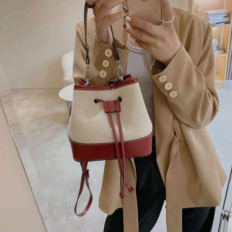 2025 Winter Niche New European Fashion Women's Bucket Bag High End Crossbody Drawstring Patchwork PU Handheld Bag