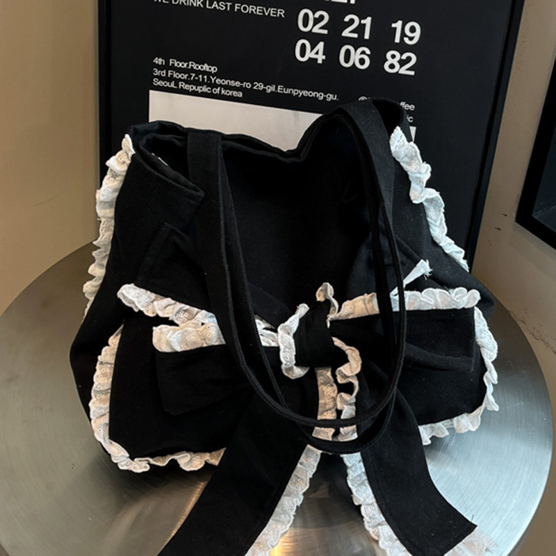 autumn new Korean sweet girl bow casual versatile simple lace handbag niche design atmosphere unique creative armpit women s bag designer shoulder bag