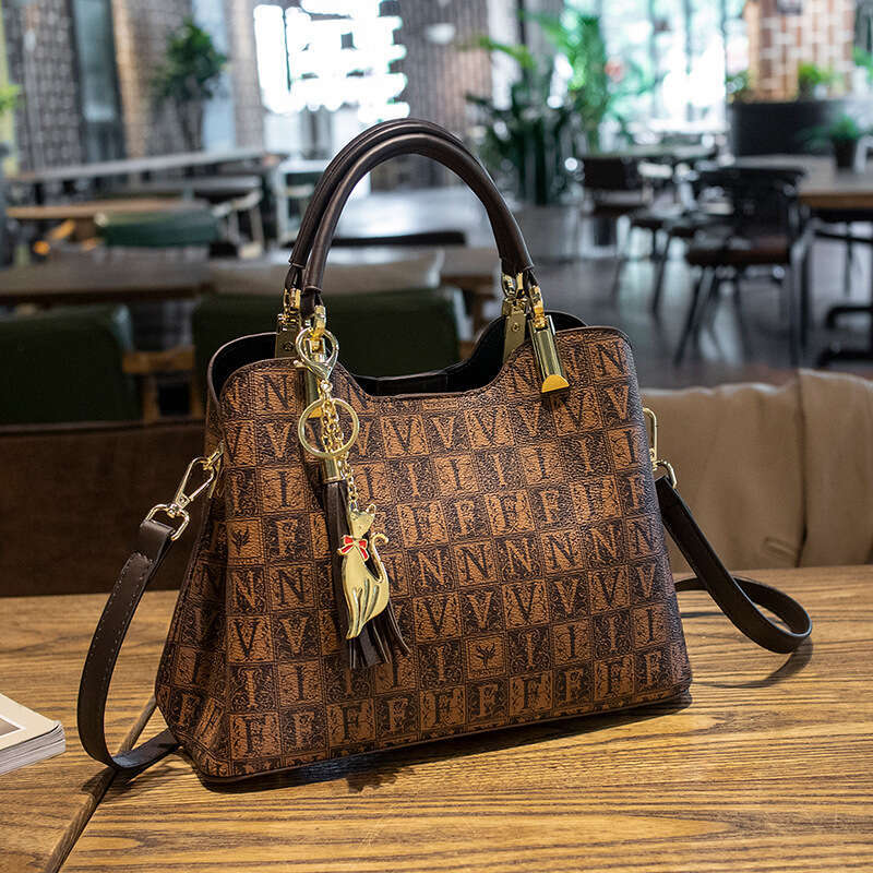 DHpet_wholesale Genuine Leather Bucket Bag - Fashion Tassel Chain Shoulder Purse for Women, Business Commute Crossbody Bag with Multiple Pockets