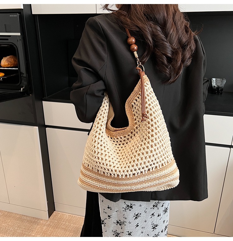 2055 autumn new hollow design woven handbag atmospheric fashion niche design casual large capacity women's vacation designer shoulder bag