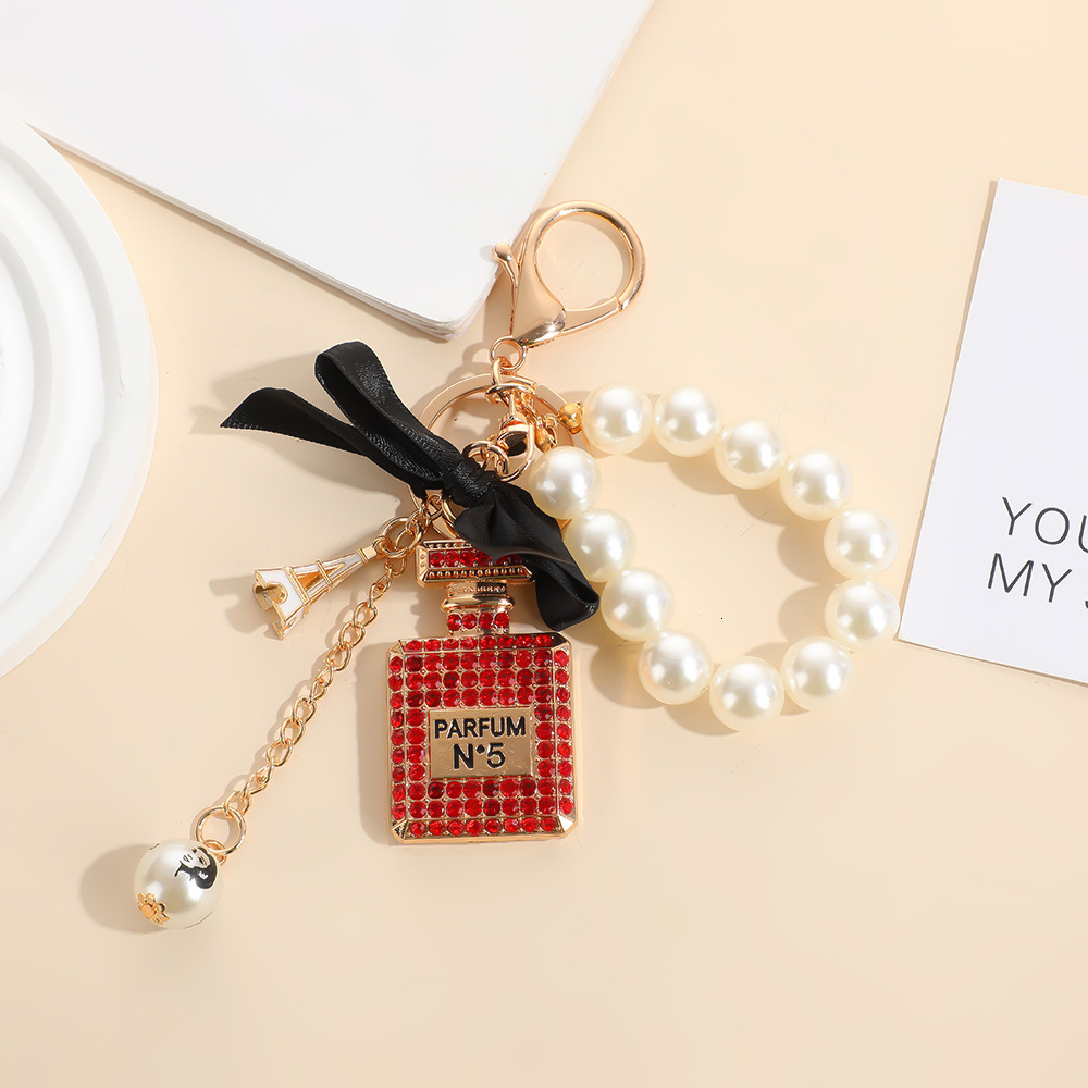 keychain designer keychain style bowknot pearl perfume bottle rhinestone bag keychain metal key pendant mini bag keychain