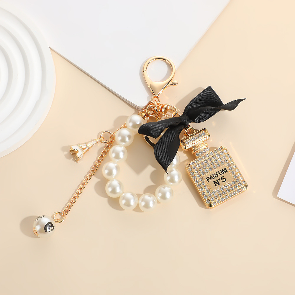 keychain designer keychain style bowknot pearl perfume bottle rhinestone bag keychain metal key pendant mini bag keychain