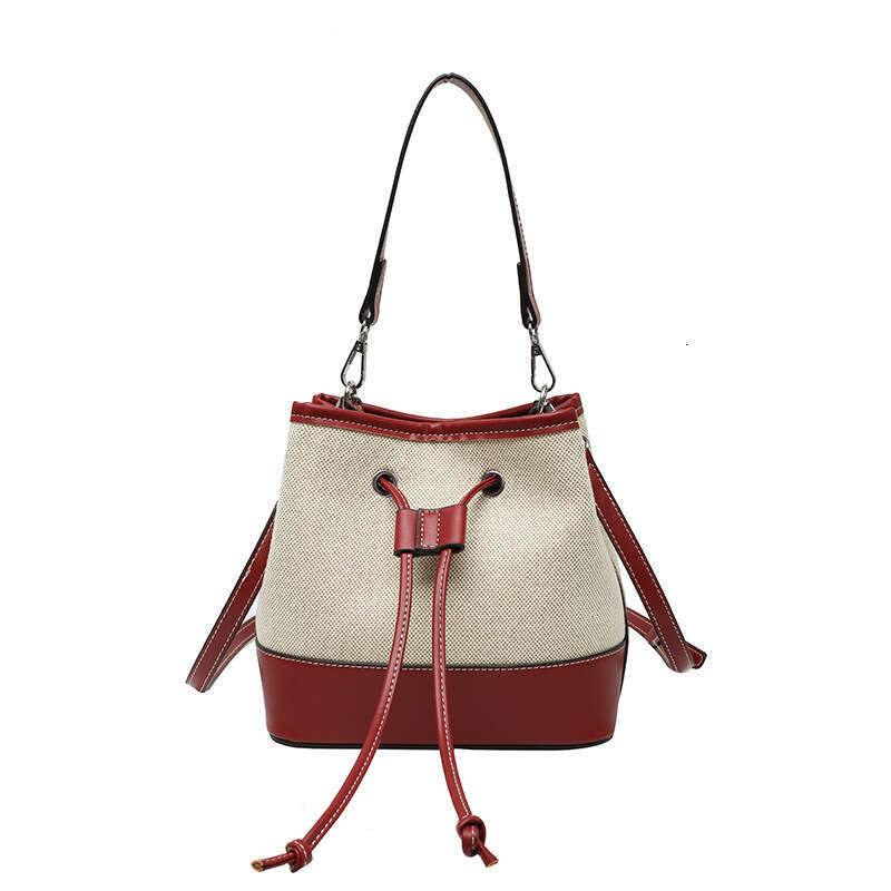 2025 Winter Niche New European Fashion Women's Bucket Bag High End Crossbody Drawstring Patchwork PU Handheld Bag
