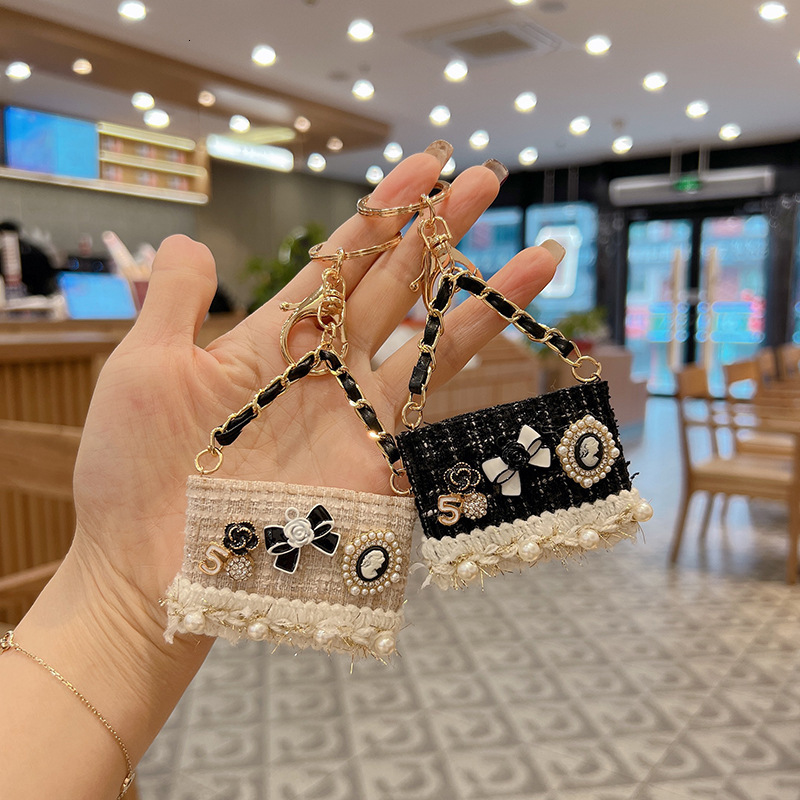 creative small fragrance camellia model new fashion pearl decoration pendant for women mini bag keychain Z260130