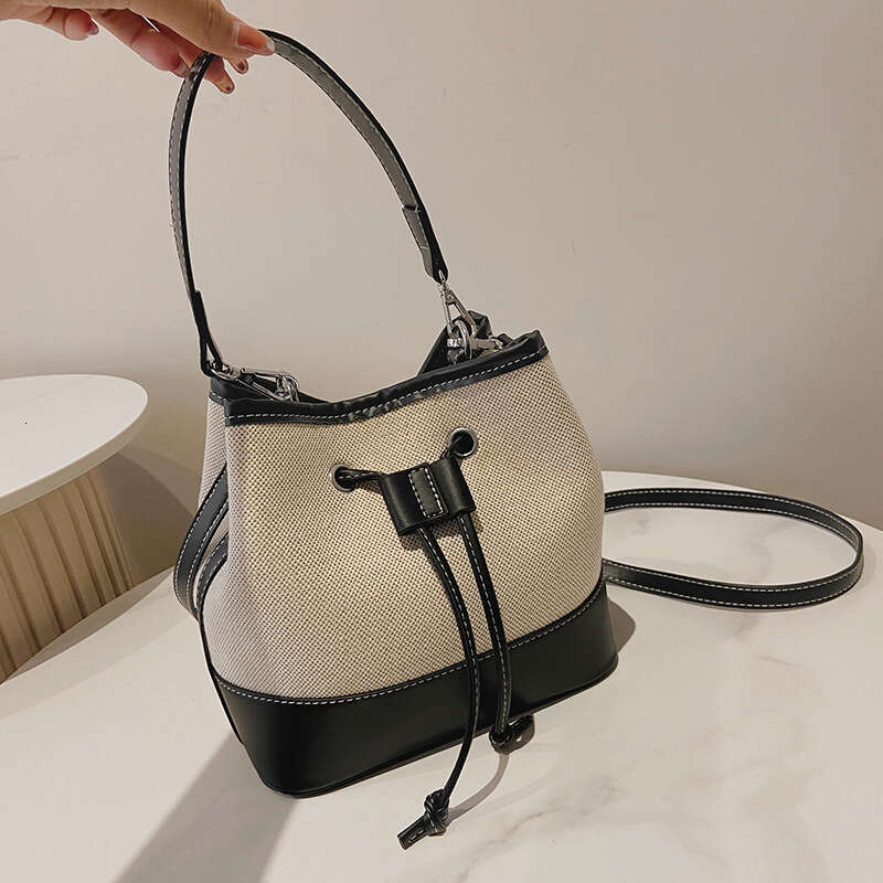 2025 Winter Niche New European Fashion Women's Bucket Bag High End Crossbody Drawstring Patchwork PU Handheld Bag