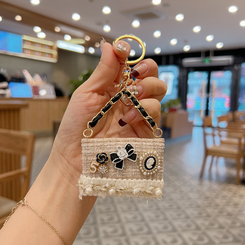 creative small fragrance camellia model new fashion pearl decoration pendant for women mini bag keychain Z260130