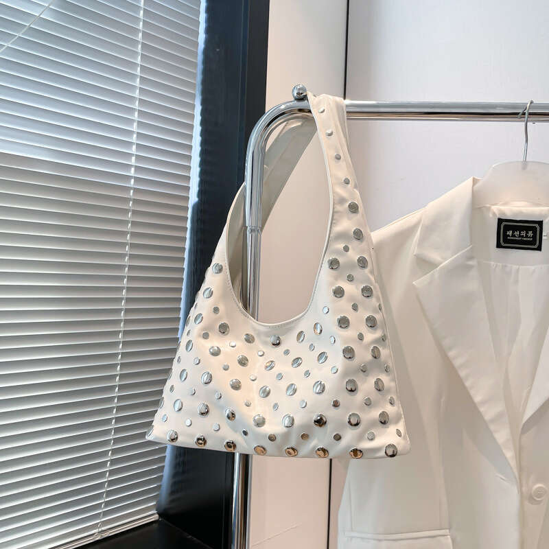 European and American Fashion Women's 2025 New Casual Personality Trendy Cool Niche Polka Dot Rivet Single Shoulder Underarm Tote Bag